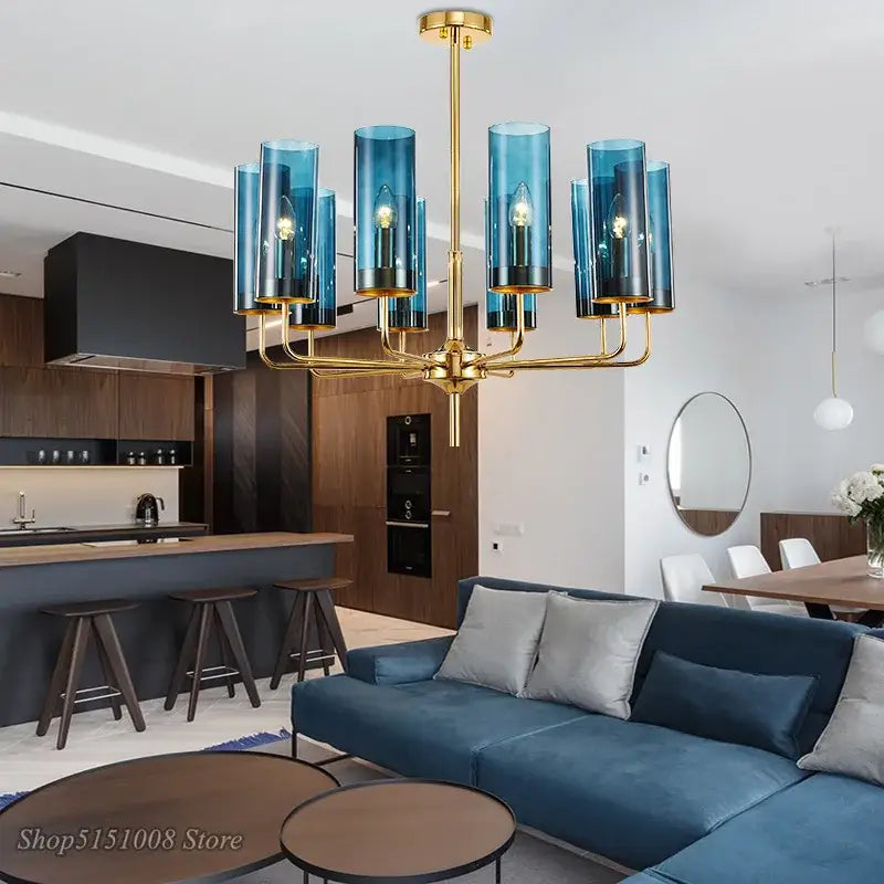 Blue glass cylinder decorbites glass chandelier with gold-toned metal arms for luxury dining room lighting