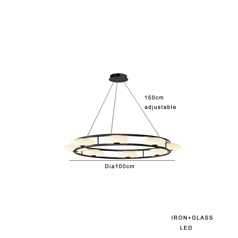 Modern black iron and glass chandelier with adjustable height in dining room featuring decorbites glass chandelier design