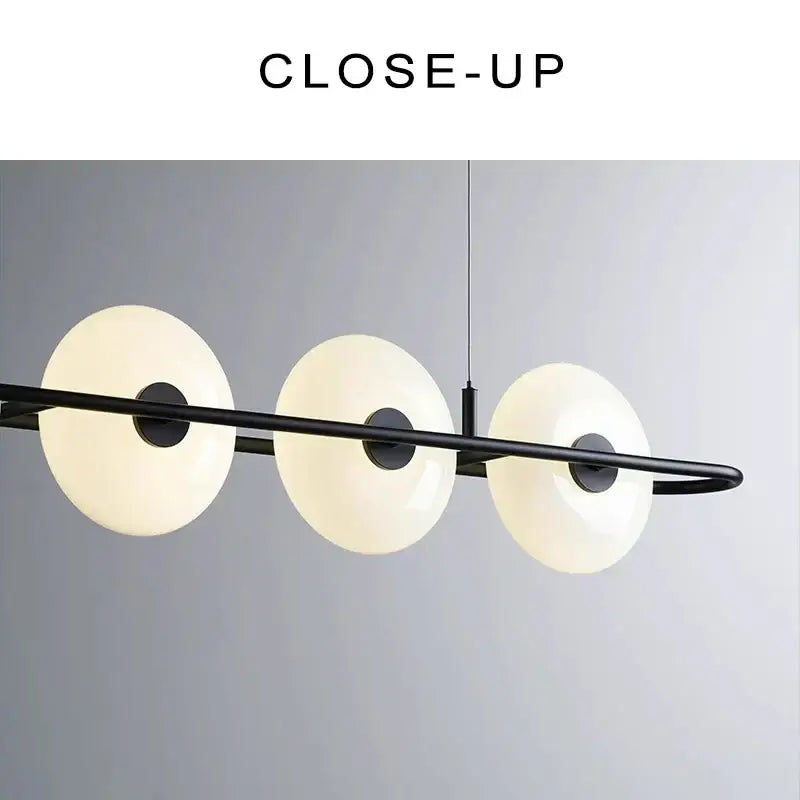 Modern black metal decorbites glass chandelier with three frosted white glass shades for dining room lighting