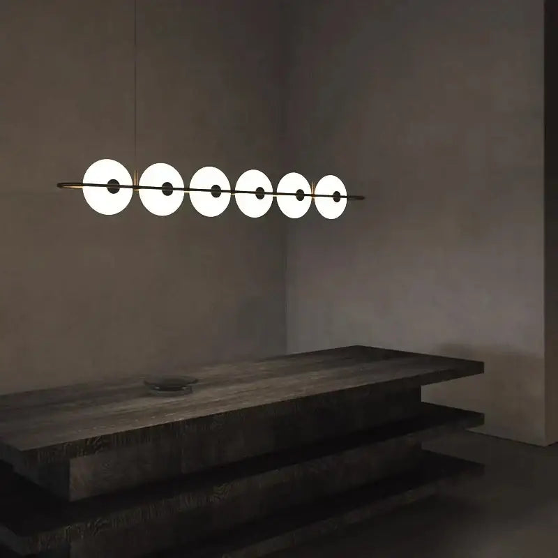 Modern minimalist decorbites glass chandelier with six white glass shades on black metal bar for dining room store exhibition