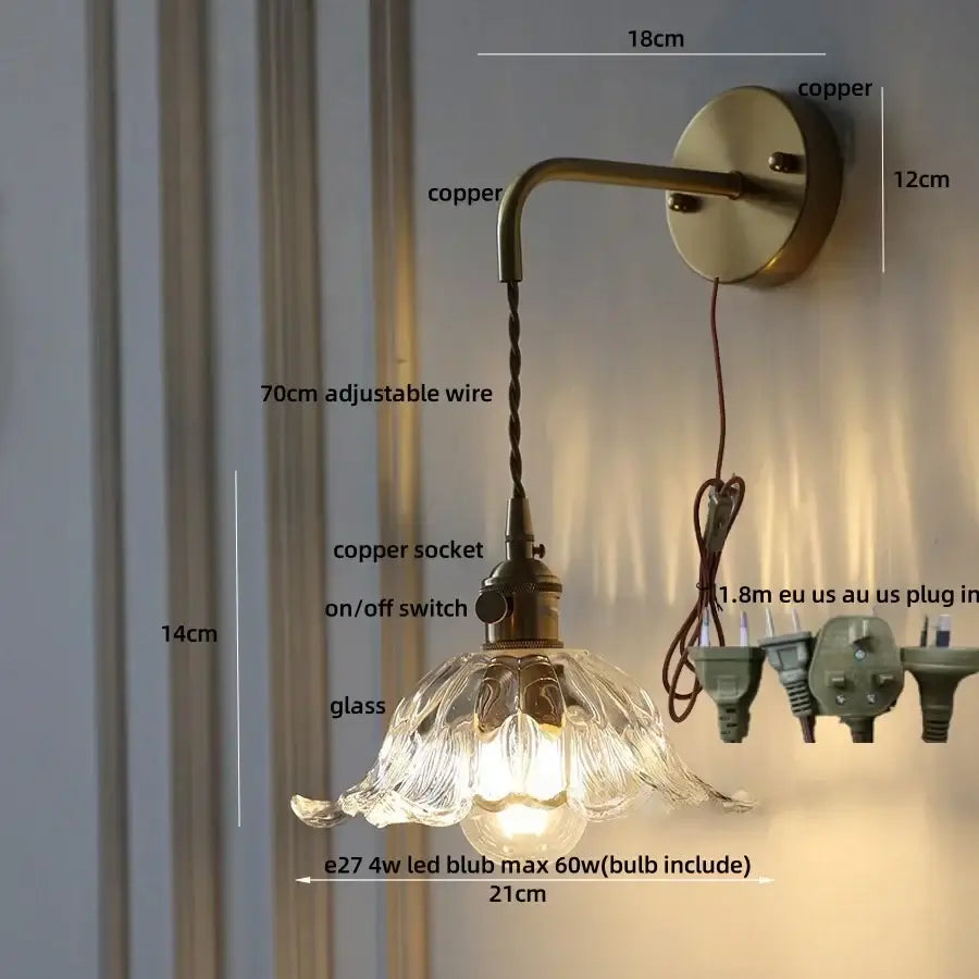 Antique brass-finished DecorBites™ flower led wall sconce with copper green flower glass shade and pull chain