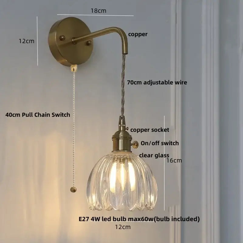 Decorbites glass and copper green flower led wall sconce with antique brass finish and faceted clear glass shade