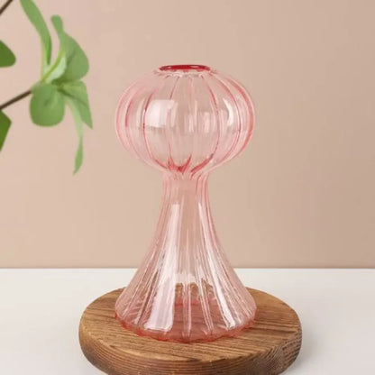 DecorBites™ glass vase in translucent pink with vertical ridges on wooden stand for hydroponic flower home decor