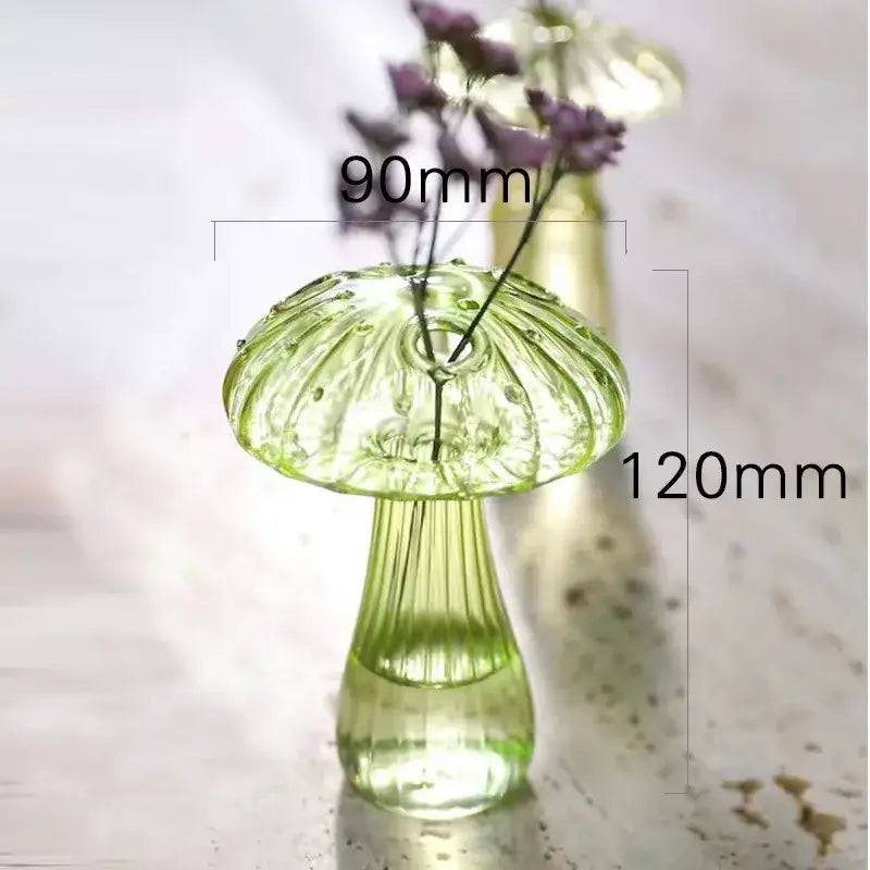 DecorBites™ glass mushroom hydroponic planter in translucent lime-green with ribbed texture holding purple flowers