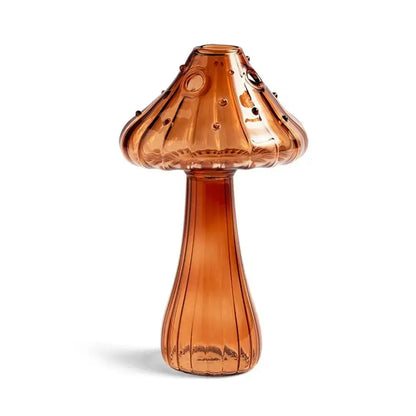 Amber-colored glass mushroom shaped vase with textured ribbed design and decorative dots from DecorBites for home decor