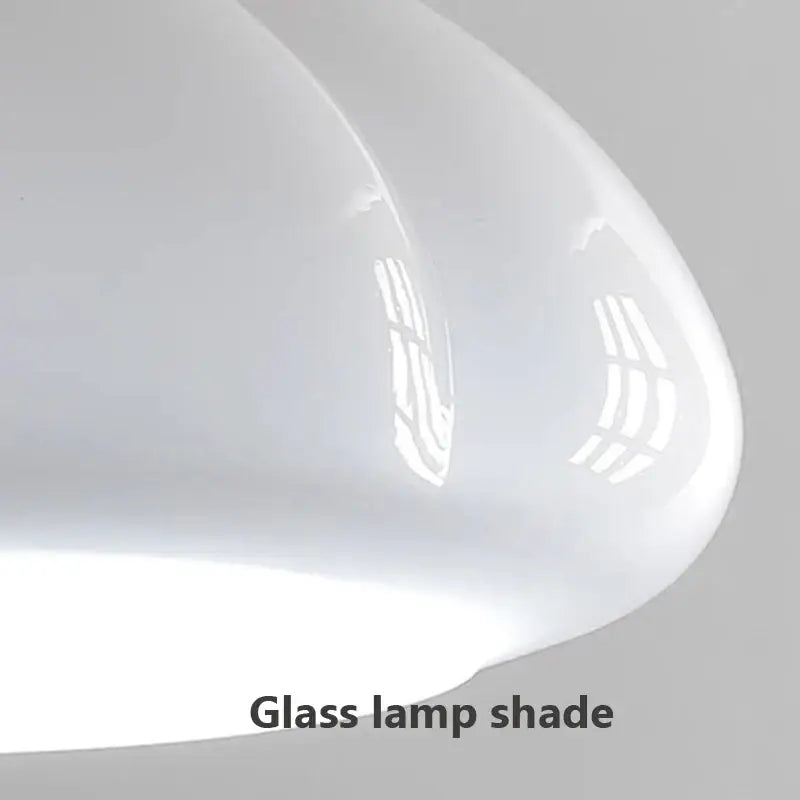 A sleek translucent white glass pendant lamp shade with smooth curved design from DecorBites™ glass pendant lamps
