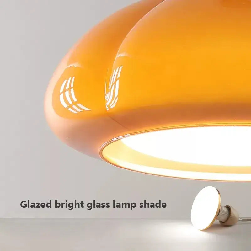 DecorBites™ glass pendant lamps with vibrant orange glazed glass shade and subtle white geometric cutouts