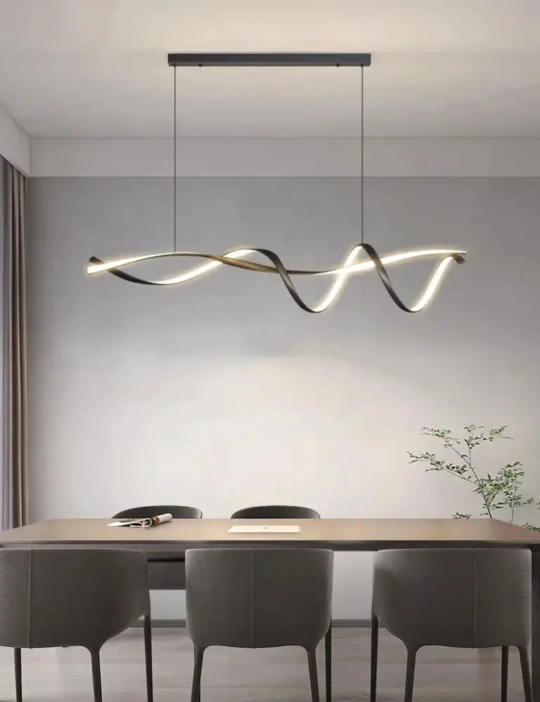 Modern black and gold glass pendant lights with twisted LED design for contemporary home decor by DecorBites™