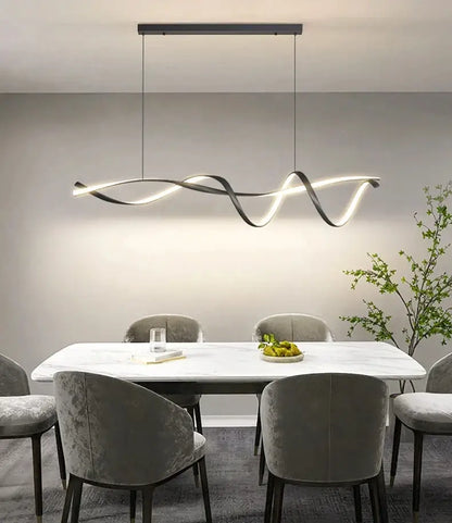 Modern black and white glass pendant lights with sleek wave-like design for contemporary home decor by DecorBites™