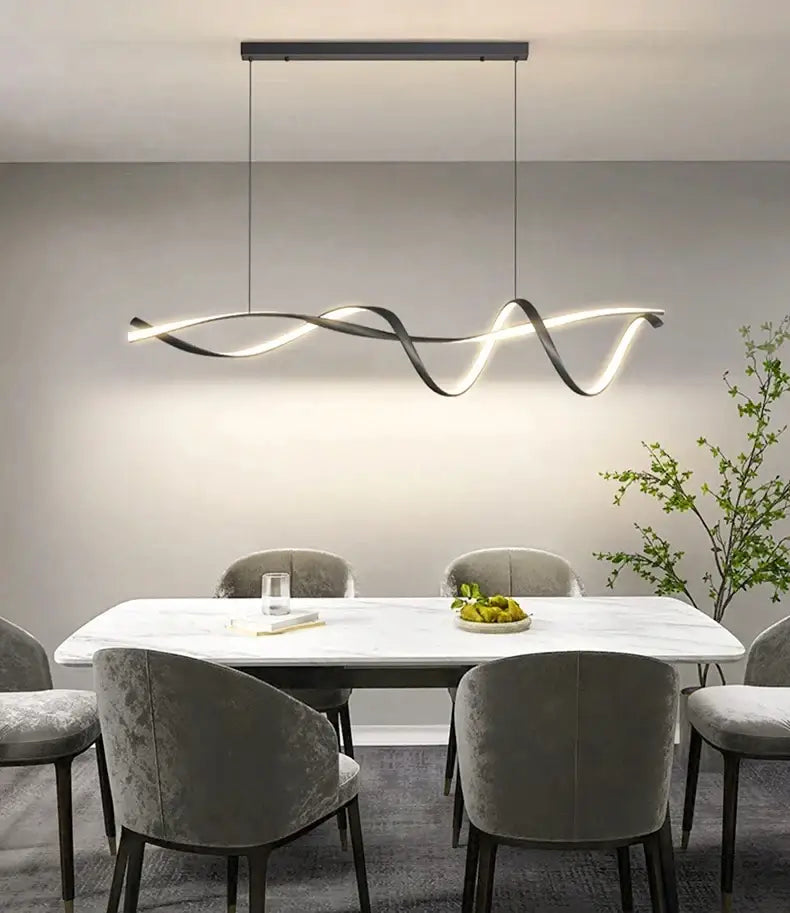 Modern black and white glass pendant lights with sleek wave-like design for contemporary home decor by DecorBites™