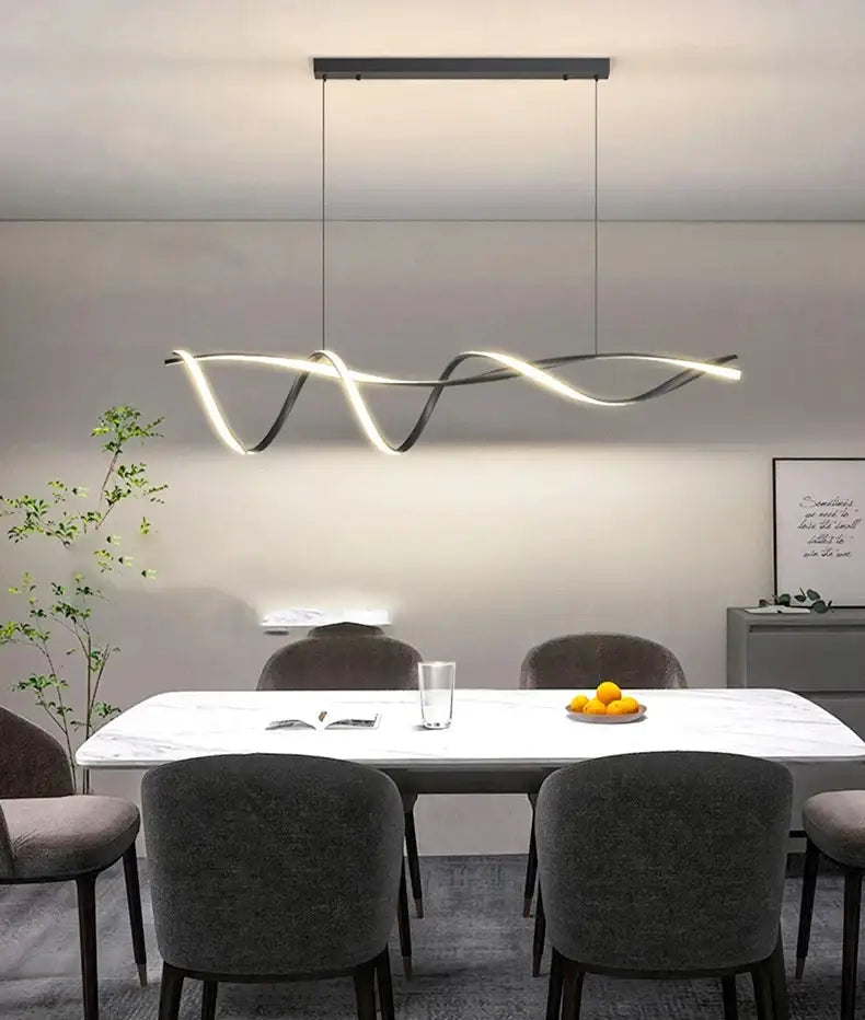 Modern black and white glass pendant lights with sleek twisted LED design for dining table by DecorBites™