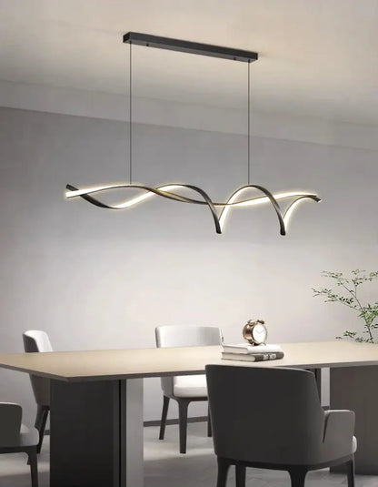 Modern black and gold glass pendant light with sleek wave-like design featuring energy-efficient LED for home decor