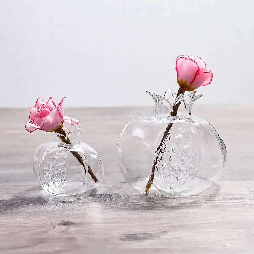 Clear glass pomegranate glass vase with textured segmented body and crown top for home decor by DecorBites