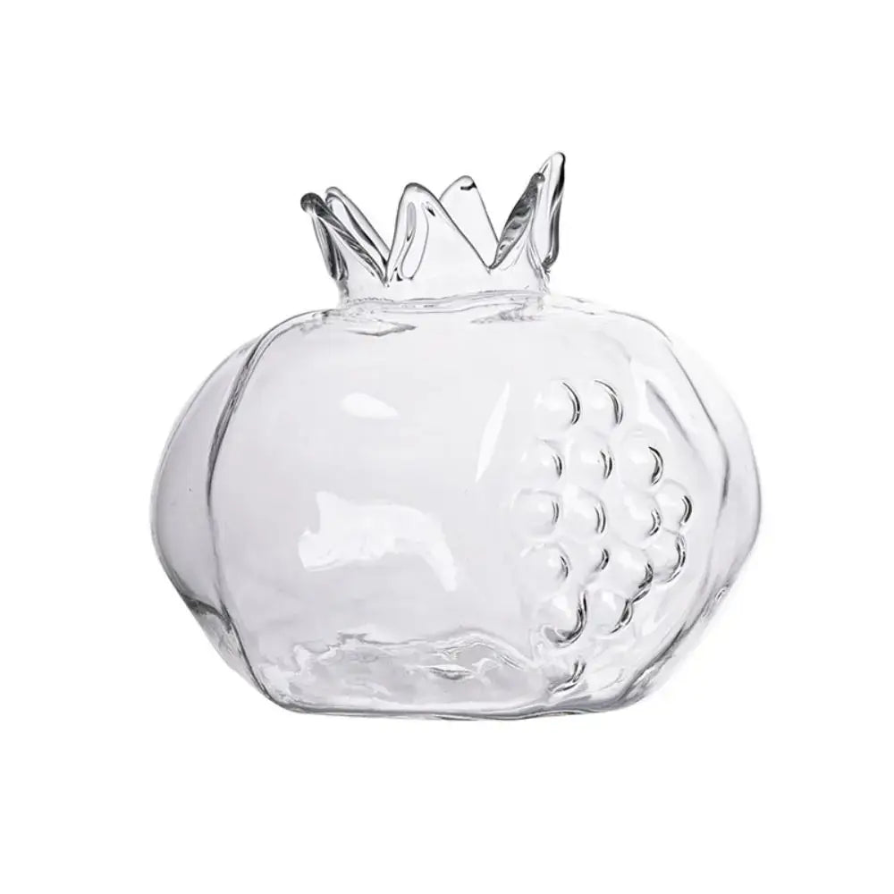 DecorBites glass vase shaped like a clear pomegranate with molded segments and crown top for home decor