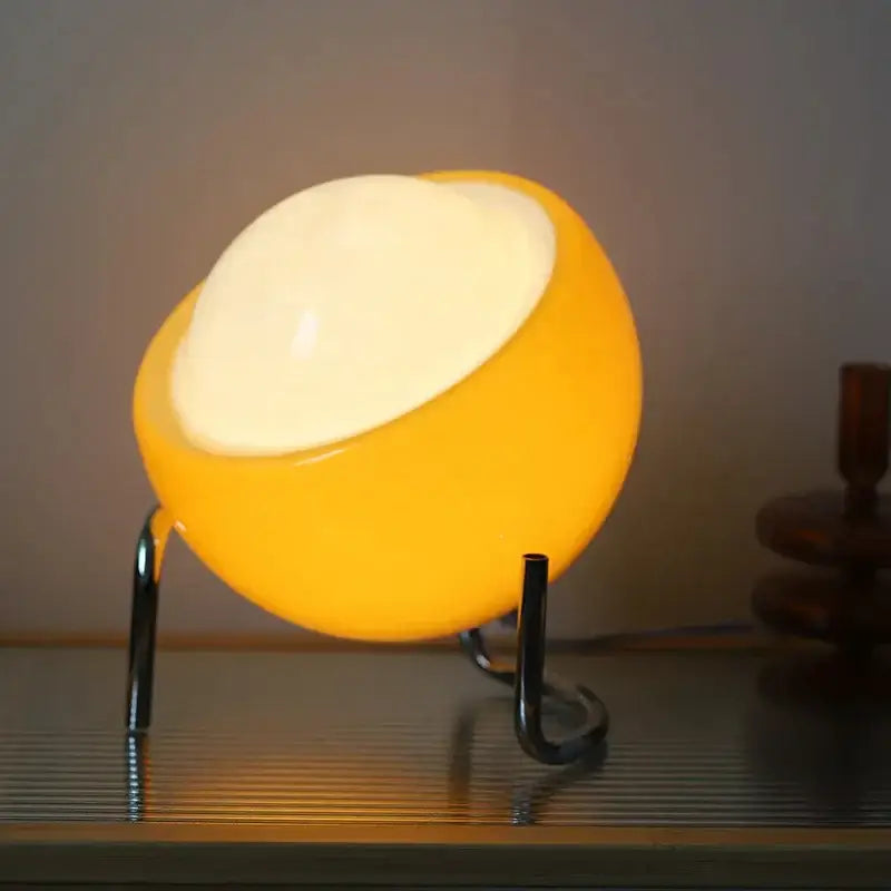 DecorBites glass table lamp with warm yellow semi-spherical translucent plastic body and white inner dome for modern decor