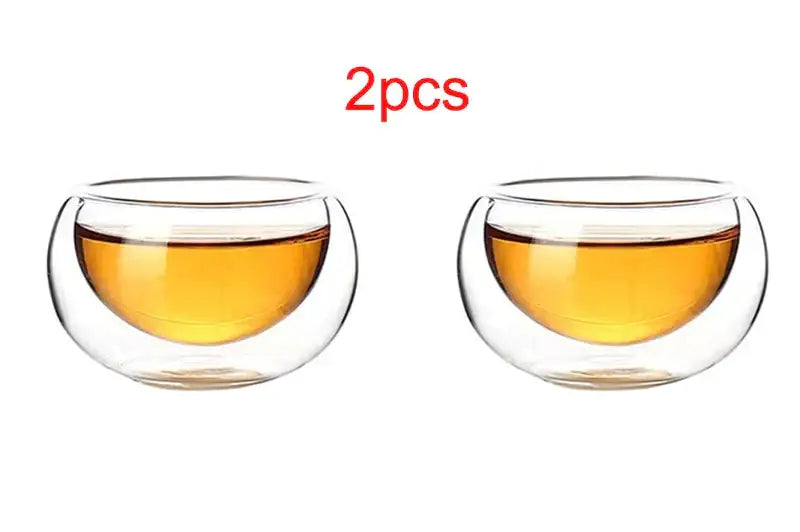 Decorbites™ glass tea pot set with clear double-walled glass tea pots filled with amber liquid for puer tea brewing