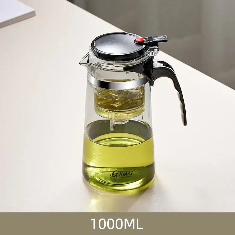 DecorBites glass tea pot with black lid handle stainless steel rim and internal infuser for loose leaf steeping