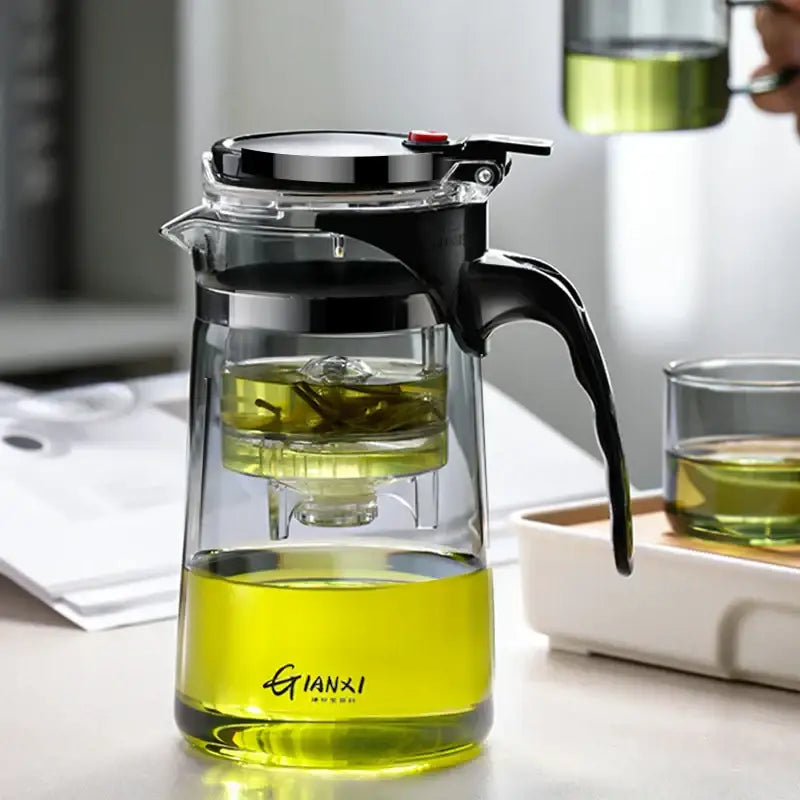 DecorBites glass tea pot with black handle features a clear dual-layer glass tea pot infuser for steeping green tea leaves