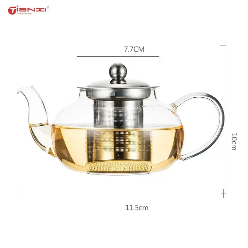 Decorbites glass tea pot with stainless steel lid handle and built-in filter containing golden yellow tea