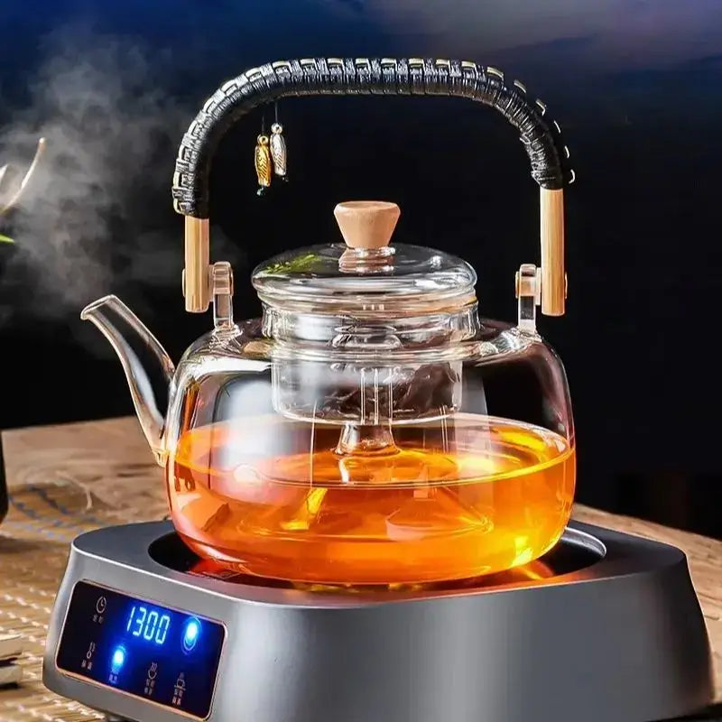 Clear glass tea pot with wooden handle and lid knob on electric heating base decorbites glass tea 900ml capacity