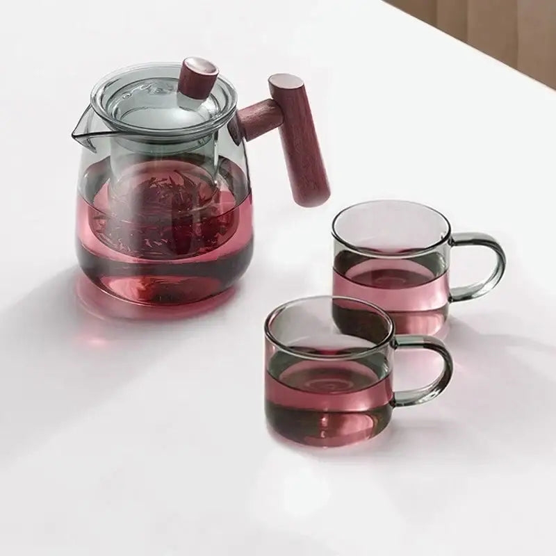 Clear glass decorbites glass tea pot with wooden handle and lid knob, heat resistant with two matching glass mugs