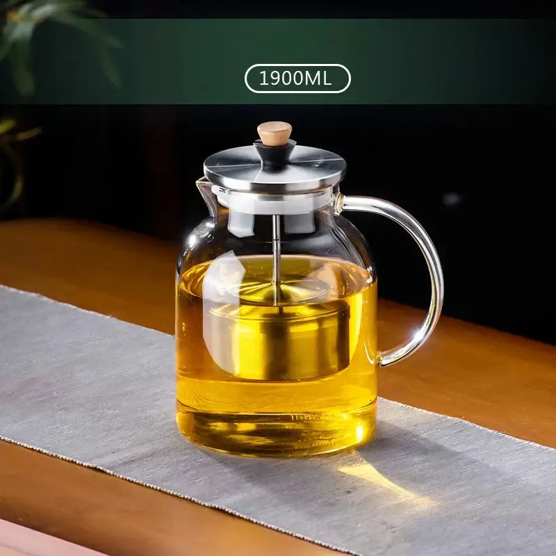Decorbites glass tea set 1900ml infuser pot with stainless steel lid wooden knob filled with golden liquid