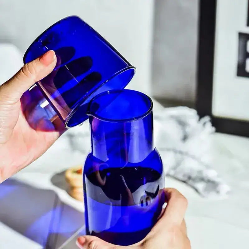 Vibrant cobalt blue decorbites glass teacup set and pitcher combo featuring heat-resistant glass and sleek modern design