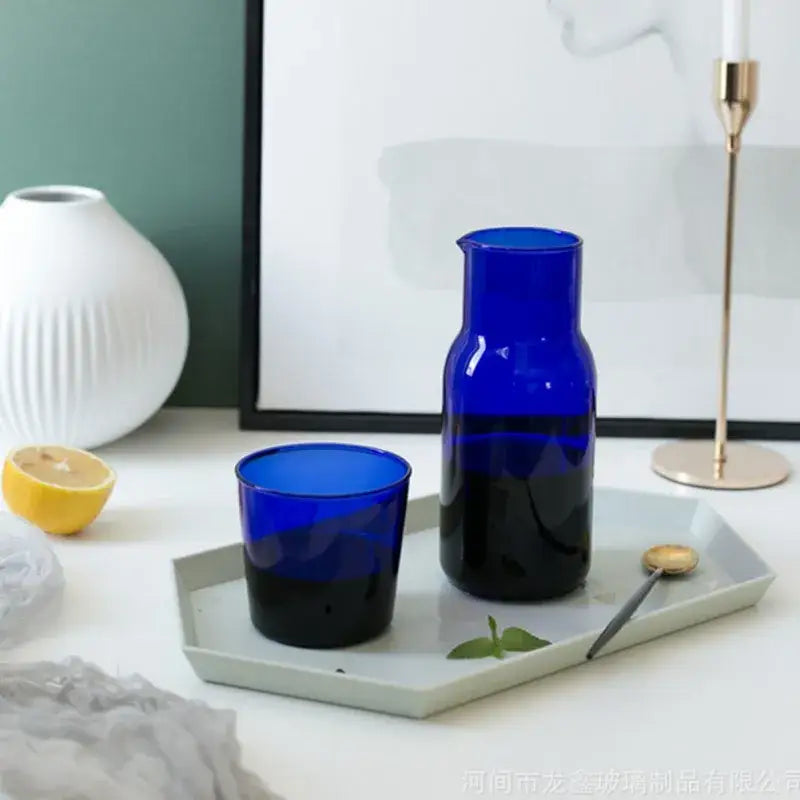 Vibrant cobalt blue glass teacup set and pitcher combo with two-tone design heat-resistant drinkware by DecorBites