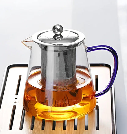 DecorBites glass teapot 550ml with stainless steel infuser and vibrant purple handle for brewing puer tea