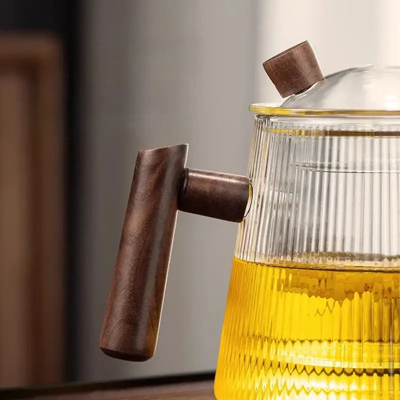 Clear decorbites glass teapot 900ml with vertical ribbed texture and dark brown wooden handle for puer kung fu tea