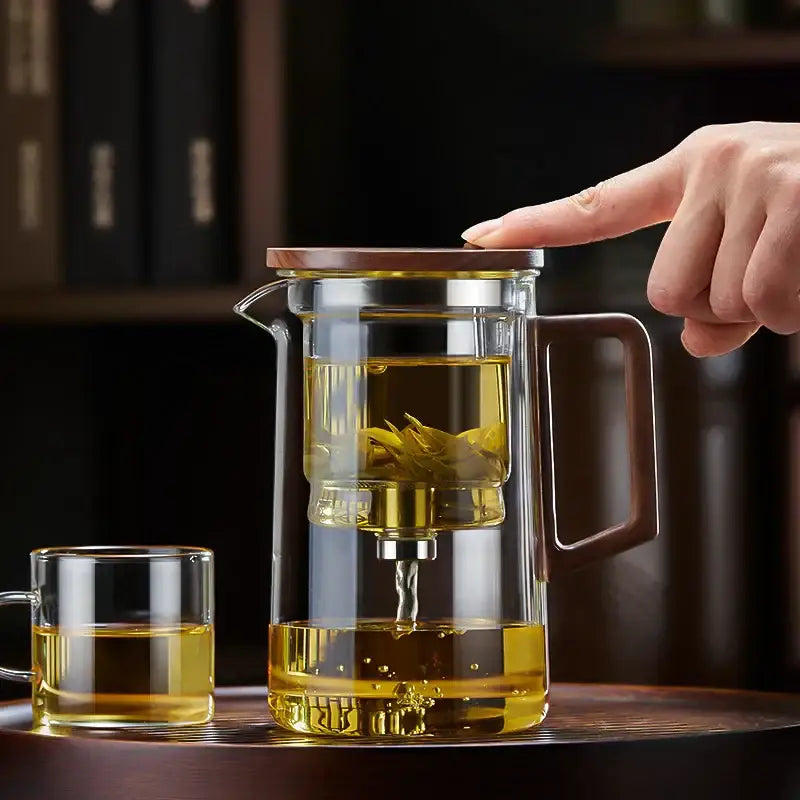 Clear glass decorbites glass teapot with wooden lid and dark brown handle featuring internal teapot filter kettle for steeping tea