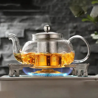 Clear glass teapot flower with stainless steel lid handle and mesh infuser in decorbites glass teapot tea set