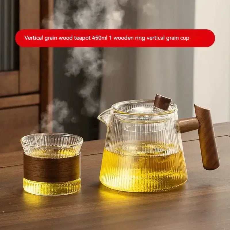Clear glass decorbites glass teapot with vertical wood grain handle and matching ribbed cup for home and restaurant brewing