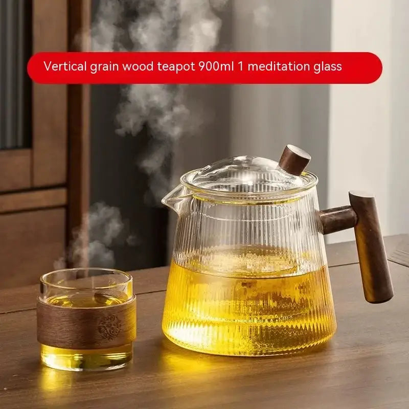 DecorBites glass teapot with vertical wood grain pattern, dark brown handle, high borosilicate glass filled with golden tea
