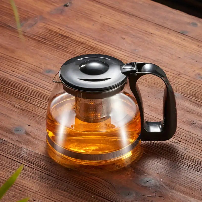 DecorBites glass teapot large capacity clear glass teapot with black lid handle and stainless steel infuser inside