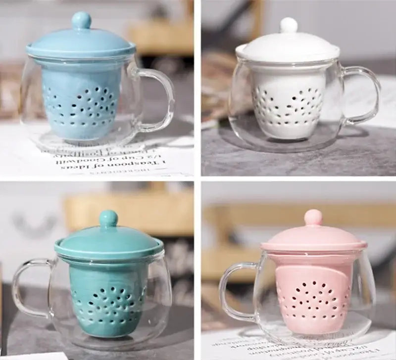 A clear glass teacup with lid and light blue ceramic filter from the decorbites glass teapot set for puer tea infusion
