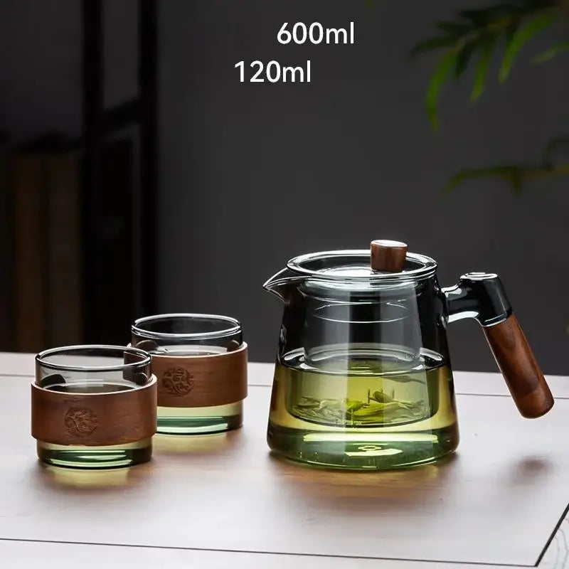 Decorbites glass teapot set with clear glass teapot, wooden handle and lid, and two glasses with brown leather wraps