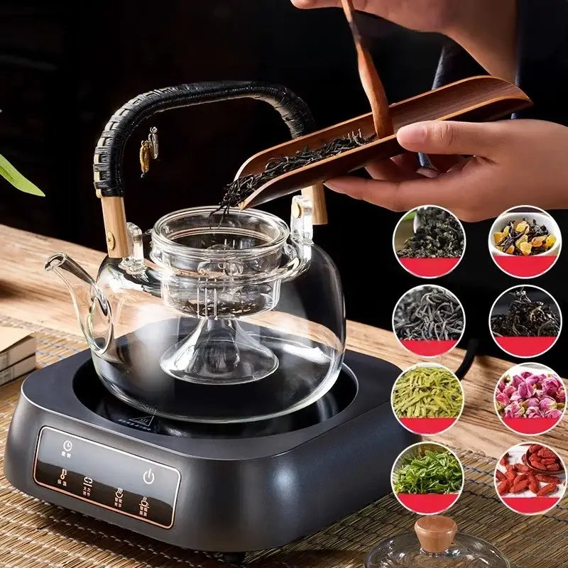 Clear glass decorbites glass teapot with black textured handle and wooden accents on electric base for tea and coffee