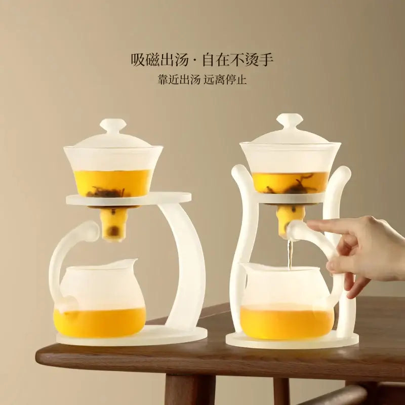 DecorBites™ glass teapot with white magnetic drip pot and transparent glass components in a modern design