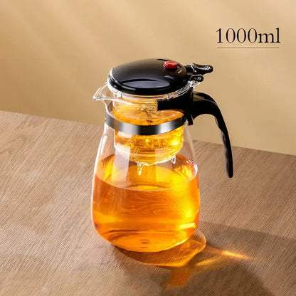 Clear glass decorbites glass teapot with black lid handle and integrated metal ring for stability and filter separation