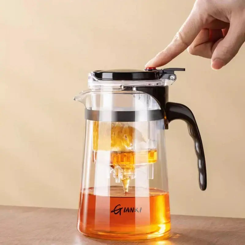 Clear glass decorbites glass teapot with black lid and handle featuring dual-layer design for tea brewing and filtration