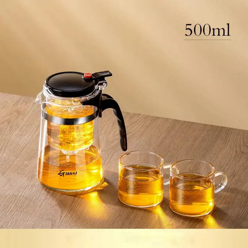 Clear glass decorbites glass teapot with black lid and handle brewing golden-yellow tea with one-button filtration