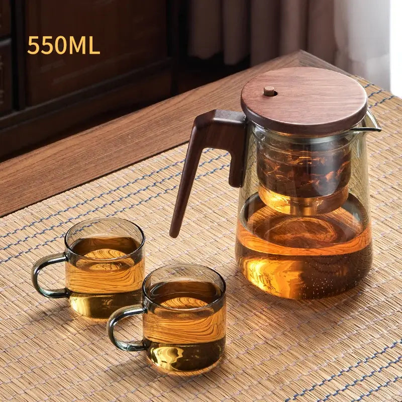 Decorbites glass teapot 550ml with wood handle and lid featuring clear glass body and amber-tinted cups heat resistant design