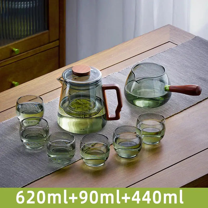 Transparent green decorbites glass teapot with wooden handle and lid with matching glasses for kung fu tea ceremony