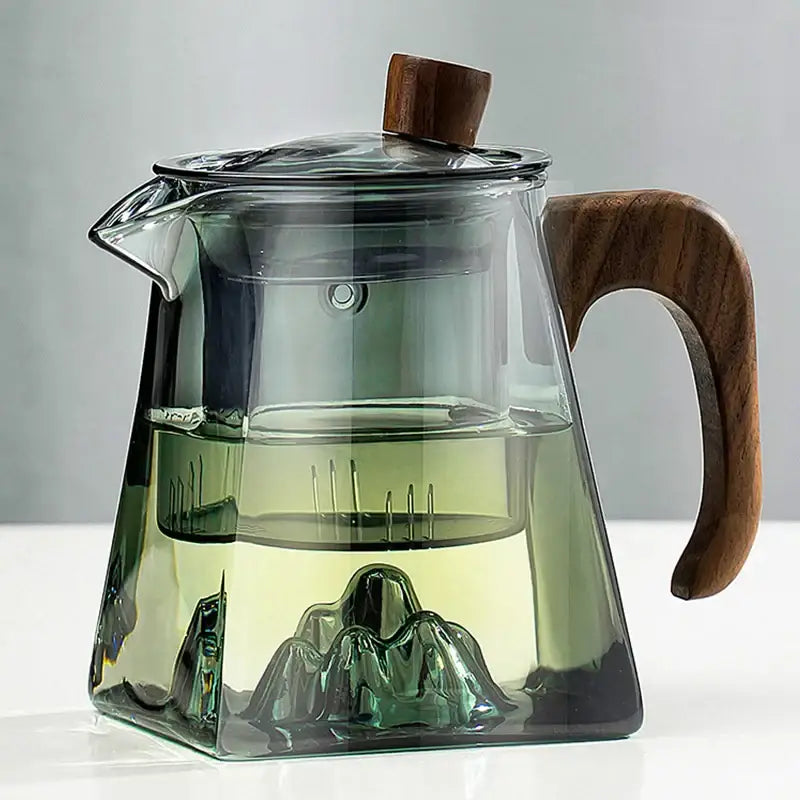 Clear glass decorbites glass teapot with wooden handle lid infuser and sculpted mountain design for kung fu tea