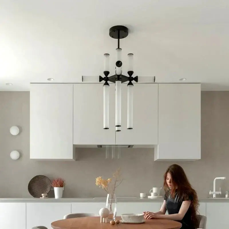 Modern black and white decorbites glass tube chandelier with geometric cross-like core pendant lamp for living spaces