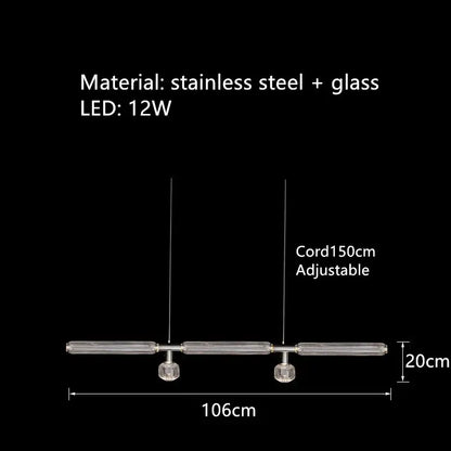 Modern minimalist DecorBites glass tubes pendant lamp with clear glass tubes and stainless steel accents for luxury lighting