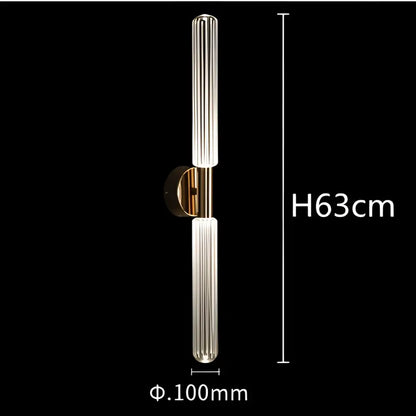 A decorbites glass tubes led chandelier wall-mounted light fixture with polished brass metal and ridged glass tubes