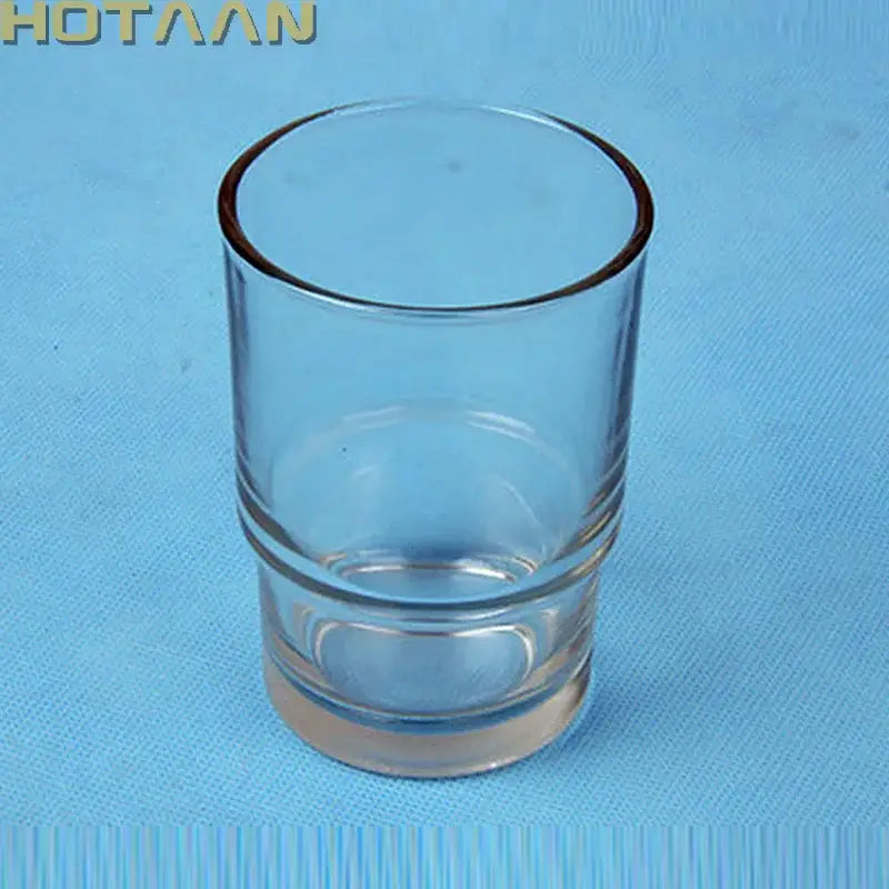 DecorBites glass tumbler cup in clear glass with thick rounded rim and ridged base for bathroom cup holder use