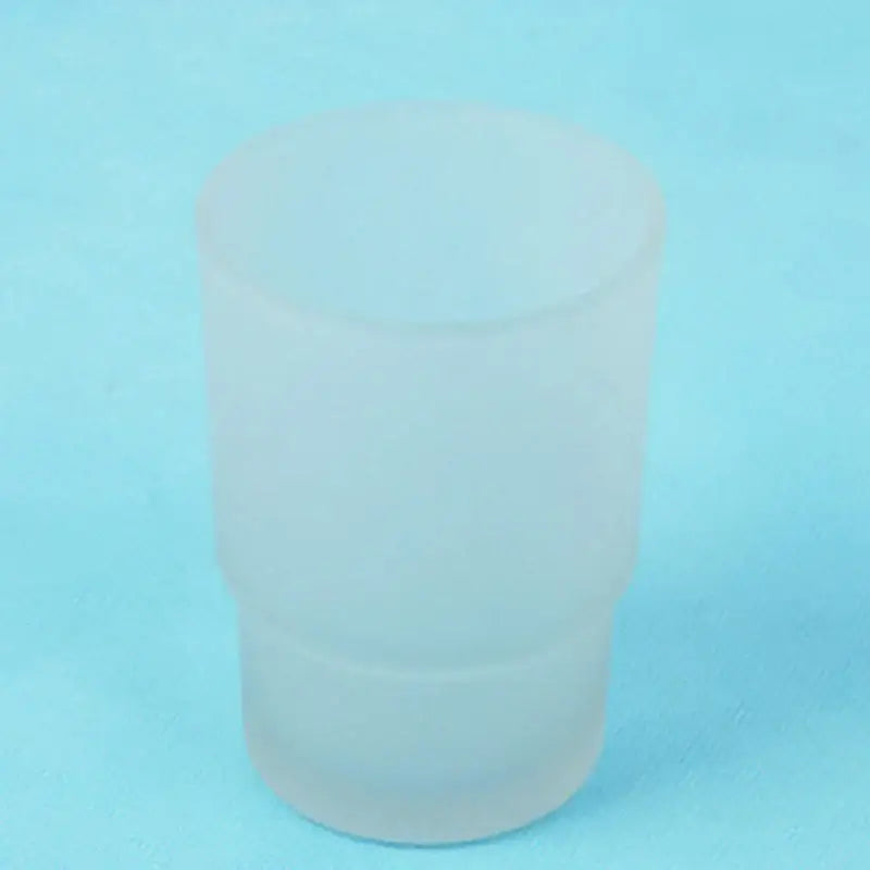 Frosted white glass tumbler cup with tapered shape and smooth edges from decorbites glass tumbler bathroom accessories